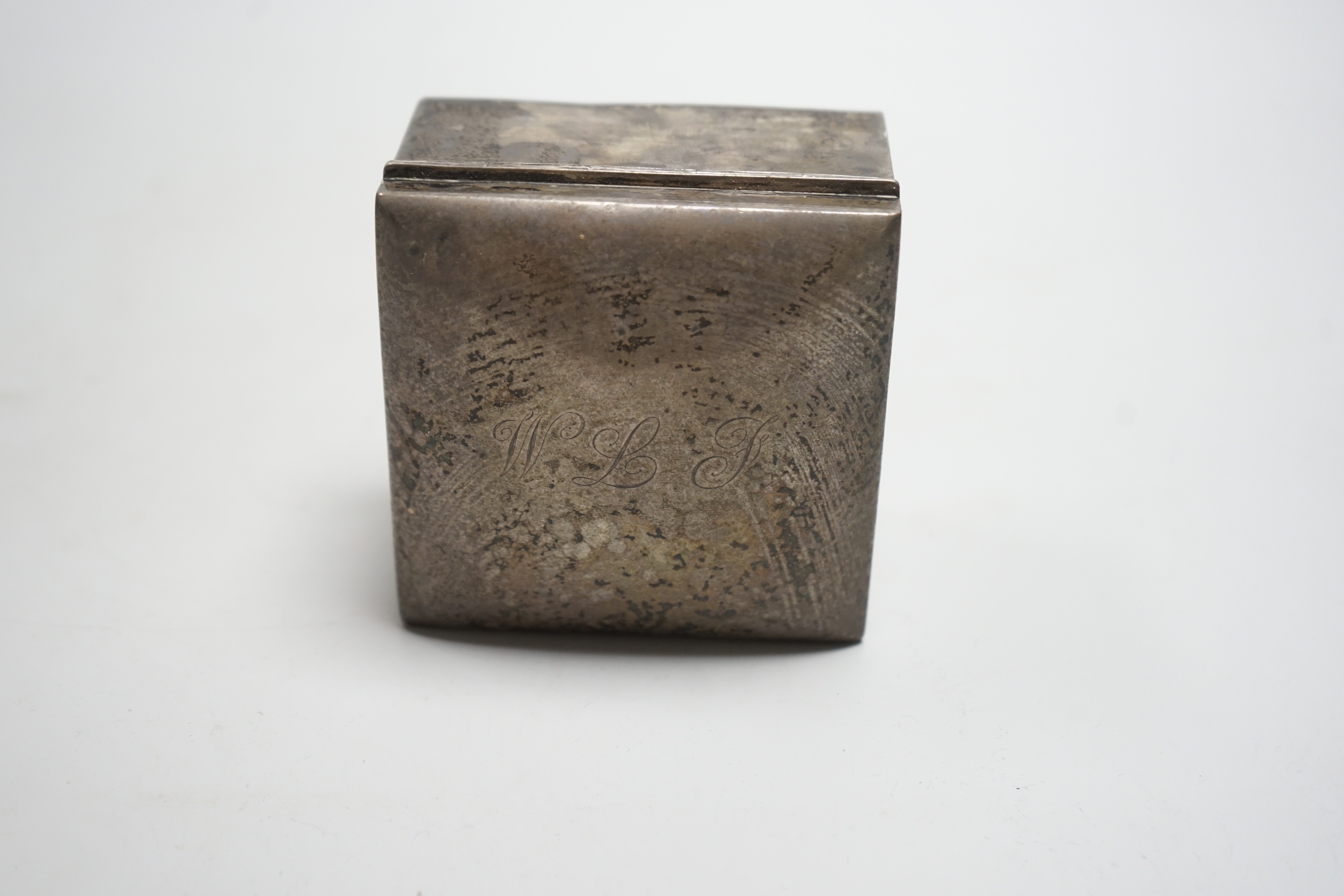 A late Victorian silver mounted square cigarette box, Mappin Bros, Birmingham, 1895, 89mm.